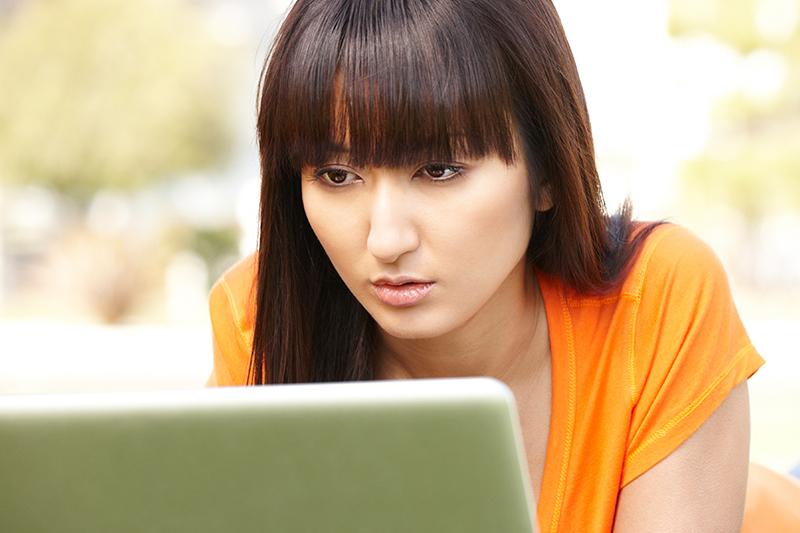 Student looking at computer